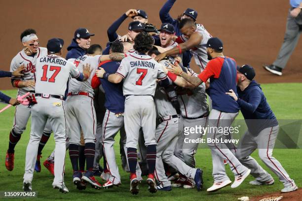 The Atlanta Braves celebrate their 7-0 victory against the Houston Astros in Game Six to win the 2021 World Series at Minute Maid Park on November...