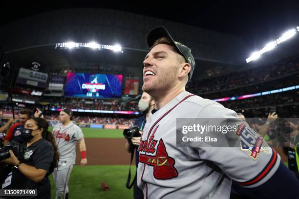 Freddie Freeman of the Atlanta Braves celebrates after the 7-0 victory against the Houston Astros in Game Six to win the 2021 World Series at Minute...