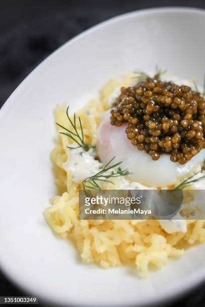 poached egg onsen style with caviar creme fraiche anf potatoes - sturgeon fish stock pictures, royalty-free photos & images