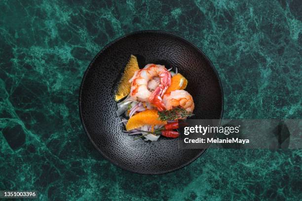 seafood prawn salad with oranges and chili - lobster dinner stock pictures, royalty-free photos & images
