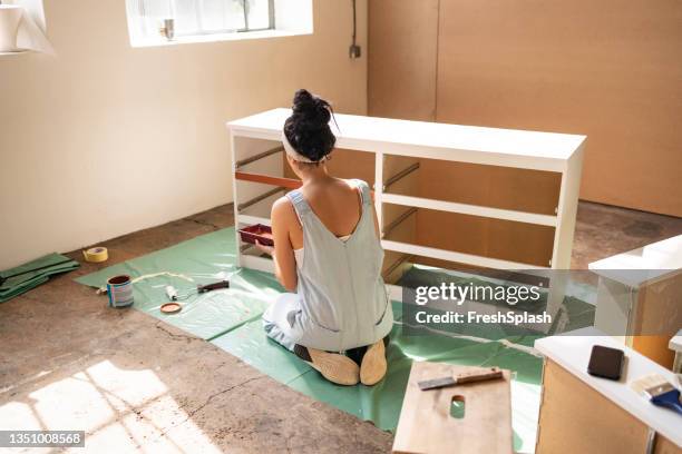 unrecognizable woman painting chest of drawers - chest of drawers 個照片及圖片檔