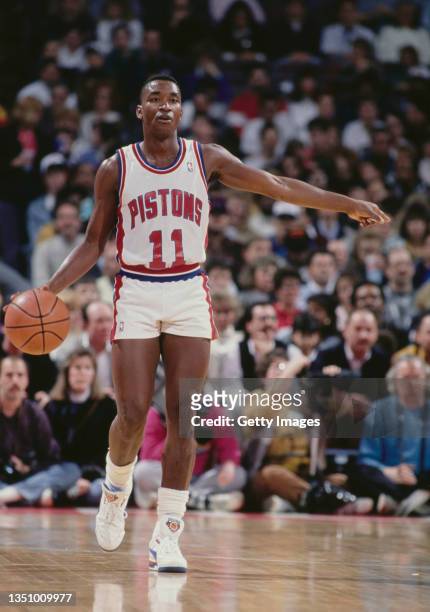 Isiah Thomas, Point Guard for the Detroit Pistons brings the basketball downcourt during the NBA Midwest Division basketball game against the Houston...