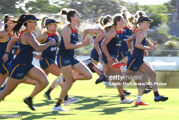 Crows women sprint during an Adelaide Crows AFLW training session at West Lakes on November 03, 2021 in Adelaide, Australia.
