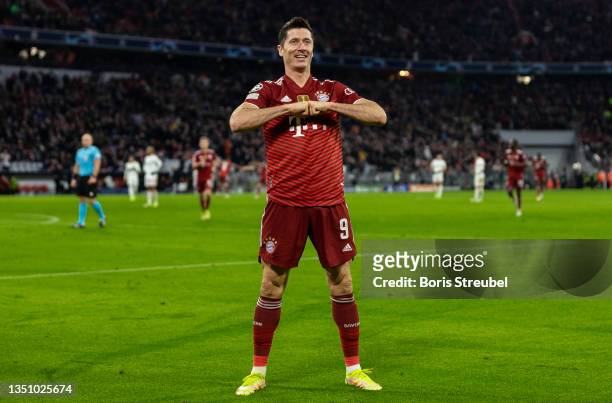 Robert Lewandowski of FC Bayern Muenchen celebrates after scoring his team's fourth goal during the UEFA Champions League group E match between FC...