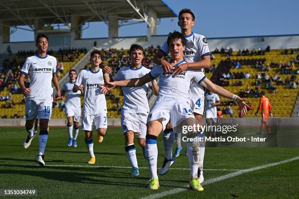 Giovanni Fabbian of FC Internazionale celebrates with teammates after scoring his team's second goal during the UEFA Youth League match between FC...