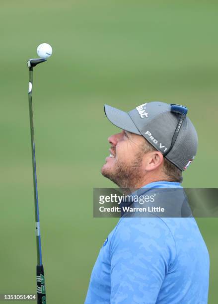 George Coetzee of South Africa jokes around as he plays in the pro am ahead of the Portugal Masters at Dom Pedro Victoria Golf Course on November 03,...