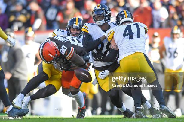 Jarvis Landry of the Cleveland Browns fumbles as he is hit by Joe Schobert of the Pittsburgh Steelers during the second half at FirstEnergy Stadium...