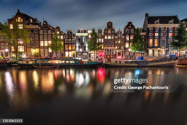 colorful lights in amsterdam at night - amsterdam dusk evening foto e immagini stock