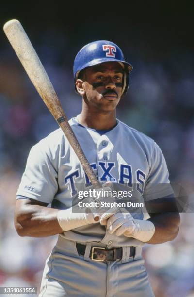 Julio Franco from the Dominican Republic and Shortstop, Second Baseman and First Baseman for the Texas Rangers prepares to bat during the Major...