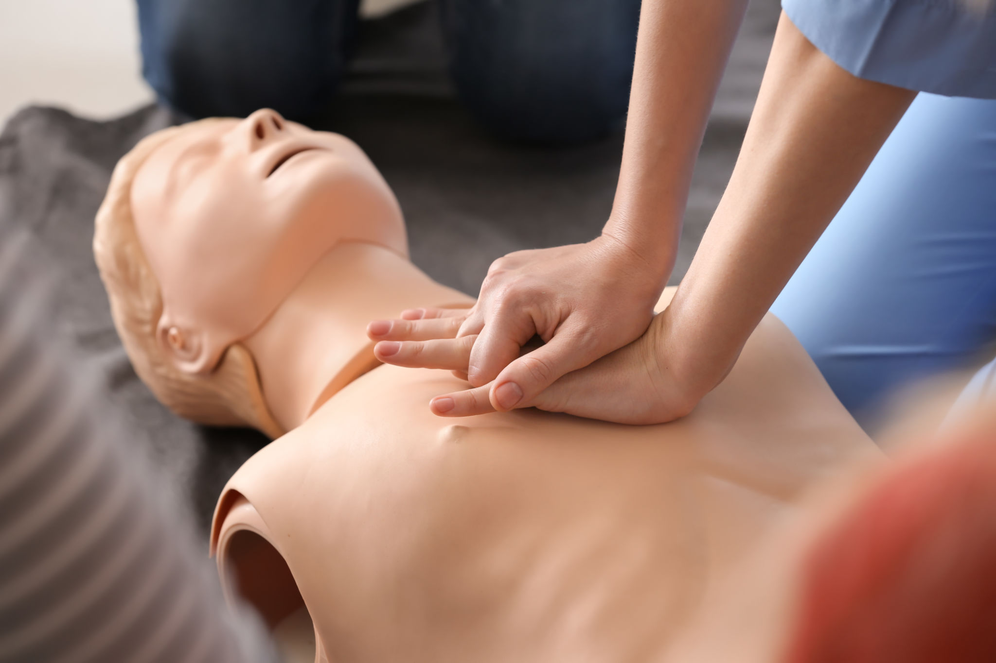 students learning CPR