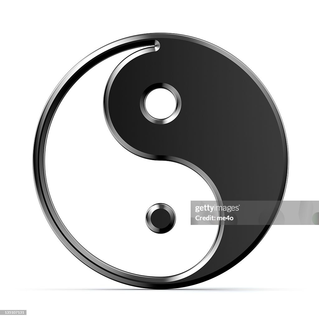 Metal yin yang symbol on white background