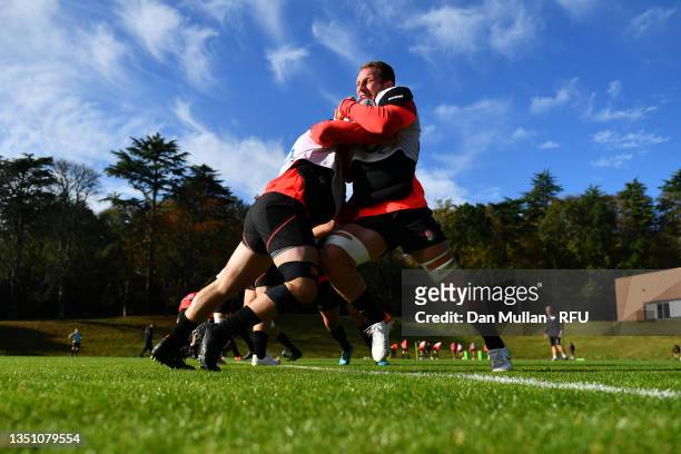 Sam Underhill of England wrestles with Jamie Blamire of England during a training session at Pennyhill Park on November 02, 2021 in Bagshot, England.