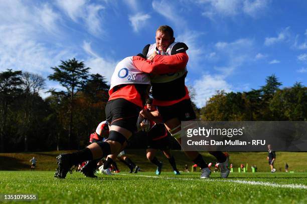 Sam Underhill of England wrestles with Jamie Blamire of England during a training session at Pennyhill Park on November 02, 2021 in Bagshot, England.