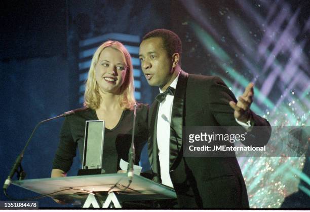 Sara Cox and Paul Green presenting the best newcomer award, The 1997 MOBO Awards, New Connaught Rooms, London, 10th November 1997.