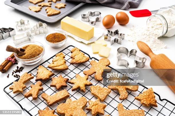 christmas cookies preparation and on white background - flour christmas stock pictures, royalty-free photos & images