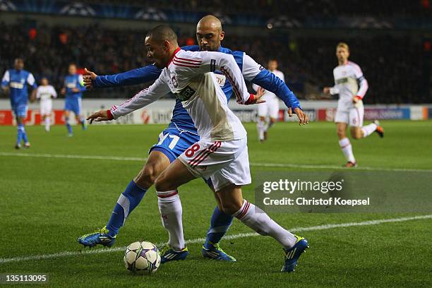 Anthony Vanden Borre of Genk challenges Sidney Sam of Leverkusen during the UEFA Champions League group E match between KRC Genk and Bayer 04...