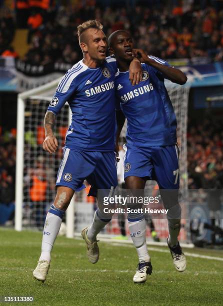 Ramires of Chelsea celebrates with Raul Meireles as he scores their second goal during the UEFA Champions League Group E match between Chelsea FC and...