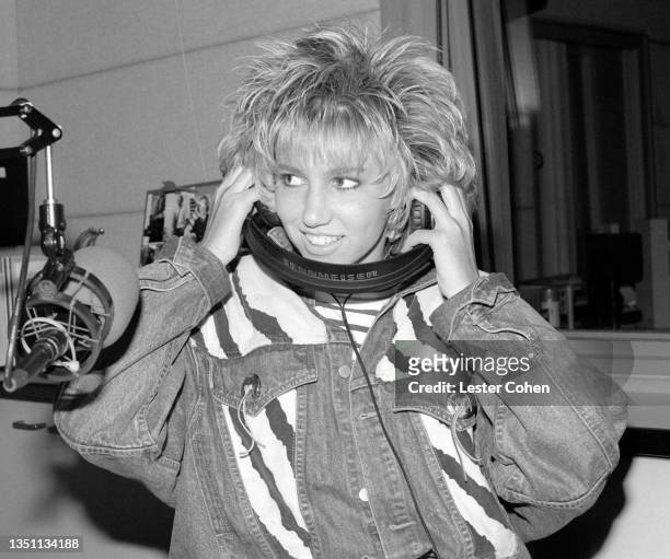American singer-songwriter, pianist, record producer and actress Debbie Gibson visits the radio station KISS FM circa 1988 in Los Angeles, California.