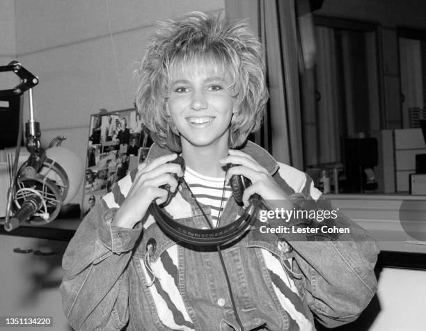 American singer-songwriter, pianist, record producer and actress Debbie Gibson visits the radio station KISS FM circa 1988 in Los Angeles, California.