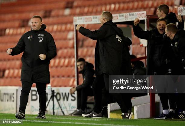 Wayne Rooney the manager of Derby County celebrates after the opening goal during the Sky Bet Championship match between Barnsley and Derby County at...