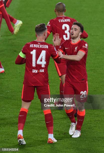 Diogo Jota of Liverpool celebrates after scoring the first goal during the UEFA Champions League group B match between Liverpool FC and Atletico...