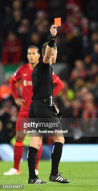 Felipe of Athletico Madrid gets a red card during the UEFA Champions League group B match between Liverpool FC and Atletico Madrid at Anfield on...