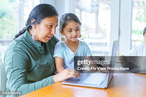 Mom working from home with homeschooled children Mom working from home with homeschooled children