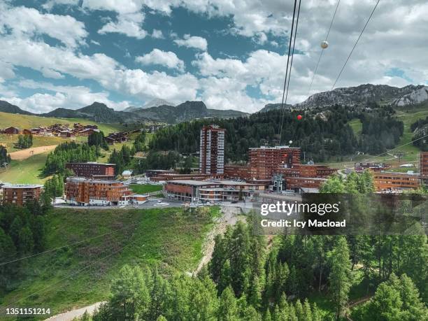 life between sky and mountain - la plagne stock pictures, royalty-free photos & images