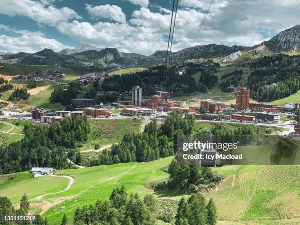 life between sky and mountain - la plagne stock pictures, royalty-free photos & images