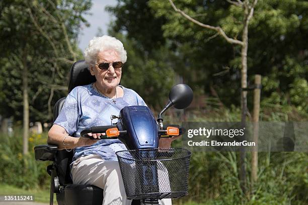 mobility scooter - motor cart stock pictures, royalty-free photos & images