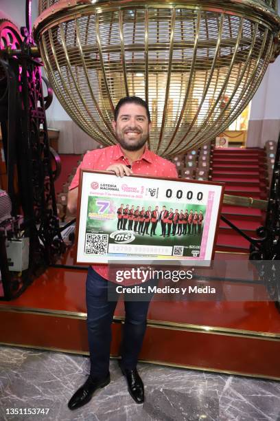 Sergio Lizarraga of Banda MS poses for a photo during the unveiling of a special lottery ticket to commemorate the 18th anniversary of Banda MS at...