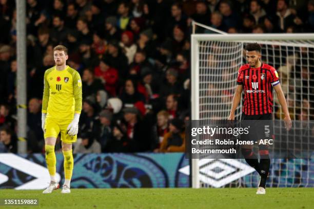 Mark Travers and Lloyd Kelly of Bournemouth ater Alistair McCann of Preston North End scores a goal to make it 2-1 during the Sky Bet Championship...