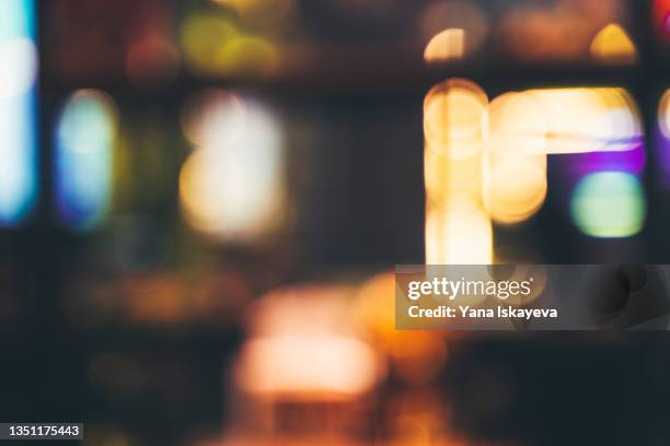 abstract defocused background of restaurant or casino neon lights indoors - casino interior photos et images de collection