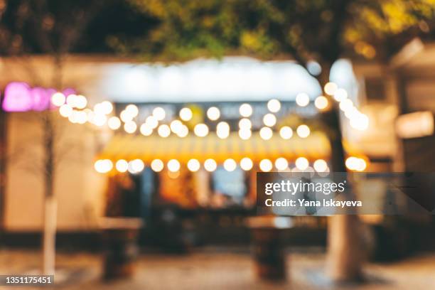 defocused background of late night street cafe or to-go fast food - out of focus background stock pictures, royalty-free photos & images