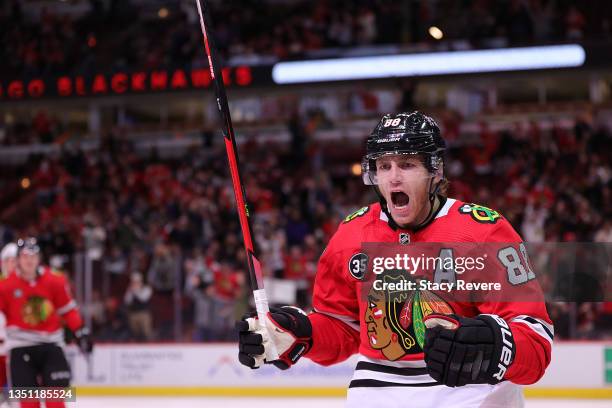 Patrick Kane of the Chicago Blackhawks reacts after scoring a goal against the Carolina Hurricanes during the second period at United Center on...