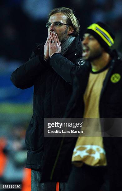Head coach Juergen Klopp of Dortmund reacts after Sebastian Kehl get challenged by Stephane Mbia of Marseille during the UEFA Champions League group...