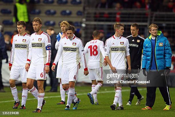 Daniel Schwaab, Simon Rolfes, Bastian Oczipka, Sidney Sam, Lars Bender, Bernd Leno and Andre Schuerrle of Leverkusen look dejected after the 1-1 draw...