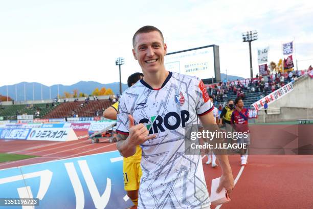 Of Fagiano Okayama poses for photographs after the J.League Meiji Yasuda J2 37th Sec. Match between Ventforet Kofu and Fagiano Okayama at JIT Recycle...