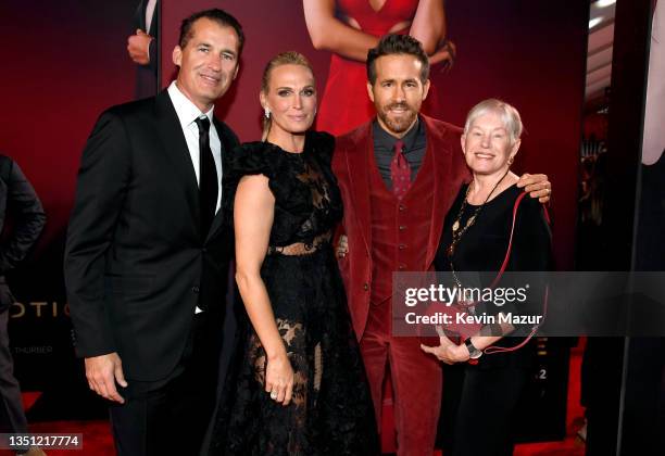 Head of Global Film at Netflix Scott Stuber, Molly Sims, Ryan Reynolds, and Tammy Reynolds attend the World Premiere of Netflix's "Red Notice" at...