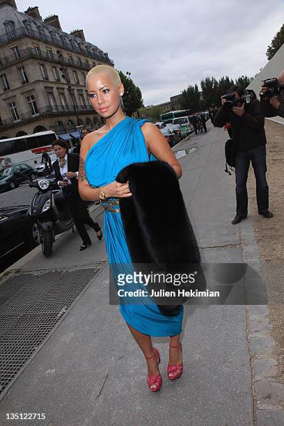 Amber Rose arrives for the Louis Vuitton Ready to Wear Spring/Summer 2011 show during Paris Fashion Week at Cour Carree du Louvre on October 6, 2010...