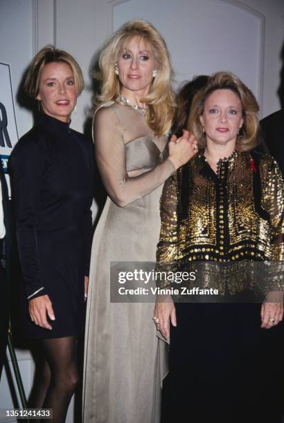American actress and comedian Amanda Bearse, wearing a black dress with a turtleneck, American actress Judith Light, wearing a champagne-coloured...
