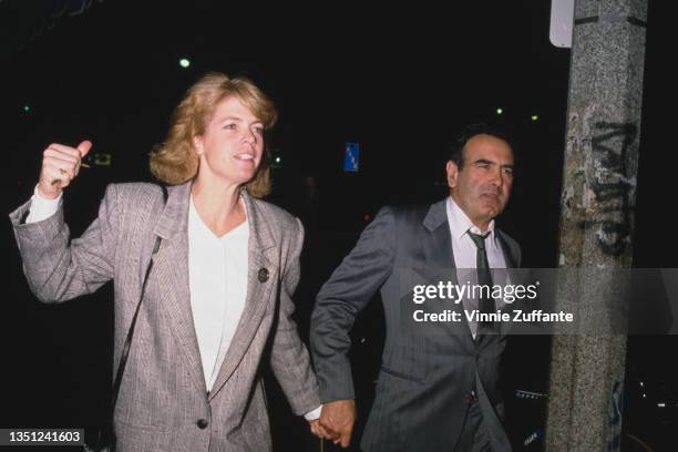 American actor Dan Hedaya and American actress Meredith Baxter attend the Westwood premiere of 'Joe Versus the Volcano' held at the Mann Regent...