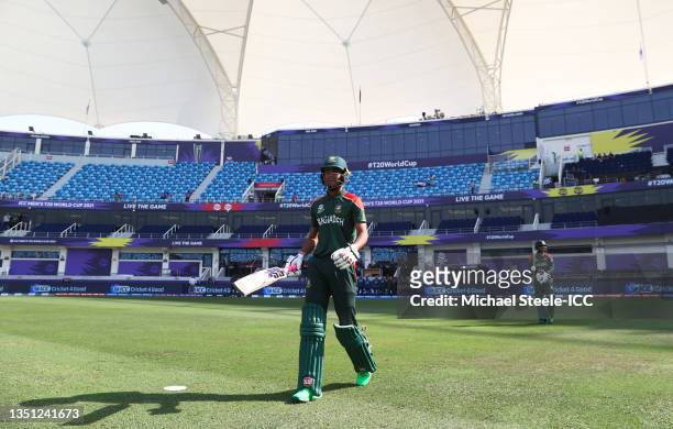 Mohammad Naim and Liton Das of Bangladesh make their way out to bat ahead of the ICC Men's T20 World Cup match between Australia and Bangladesh at...