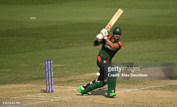 Soumya Sarkar of Bangladesh plays a shot during the ICC Men's T20 World Cup match between Australia and Bangladesh at Dubai International Stadium on...