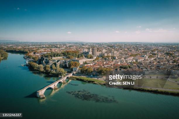 aerial view of the old city avignon, le pont saint benezet and palais des papes in avignon, france - rhone stock pictures, royalty-free photos & images
