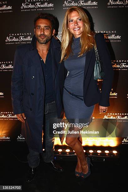 Jean-Pierre Martins and Alexandra Genoves attend the Nicolas Feuillatte 35th anniversary at Maison de l'Architecture on June 9, 2011 in Paris, France.