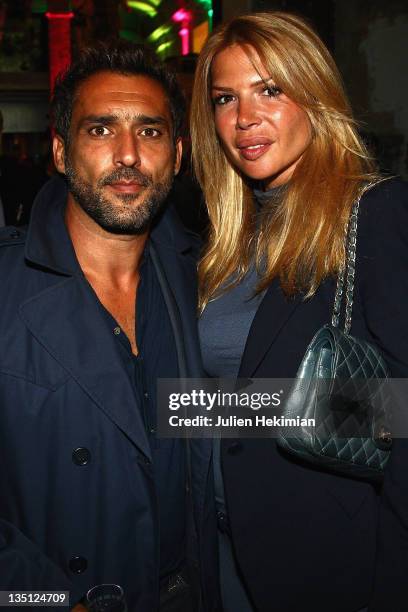 Jean-Pierre Martins and Alexandra Genoves attend the Nicolas Feuillatte 35th anniversary at Maison de l'Architecture on June 9, 2011 in Paris, France.