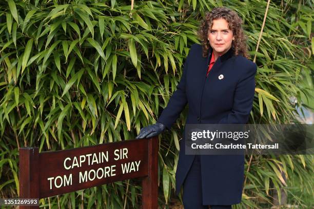 Hannah Ingram-Moore, daughter of Captain Sir Tom Moore, poses for a photograph in front of the sign marking the path named in her father's honour on...