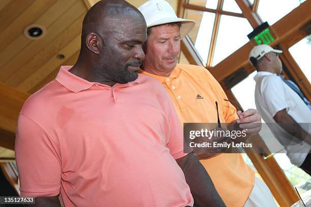 Lawrence Taylor and Dan Marino attend Backstage Creations at the American Century Golf Tournament on July 15, 2009 in Stateline, Nevada.