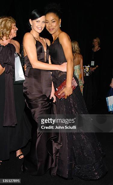Charlize Theron and Sophie Okonedo during Backstage Creations 2005 Screen Actors Guild Awards - The Talent Retreat - Day 2 at Shrine Auditorium in...